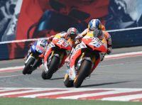 Carrera MotoGP con Pedrosa-Marquez-Lorenzo